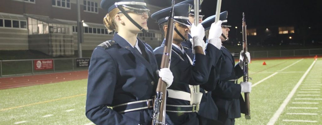 UConn cadets on drill team at a sporting event