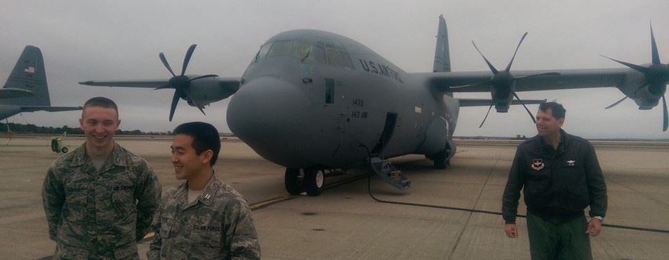 UConn cadets next to an Air Force airplane